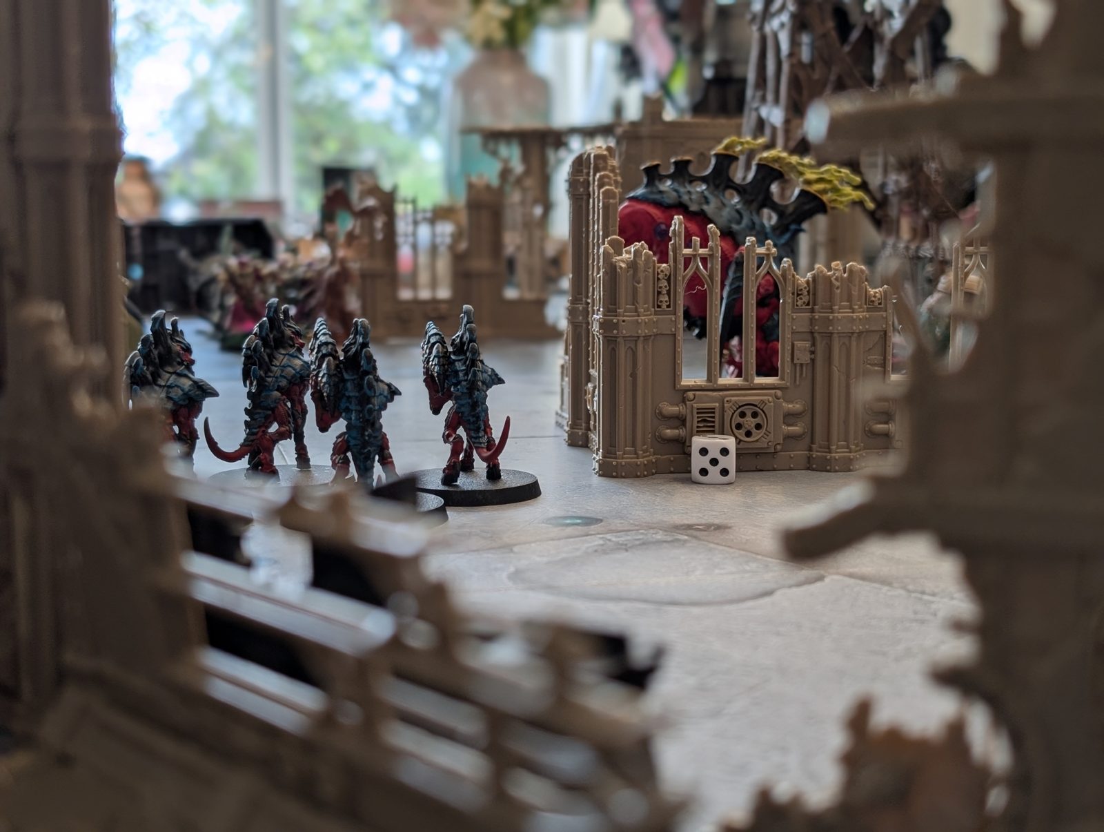 A casual game of Warhammer 40k in progress at a Battle & Brush Birmingham club night